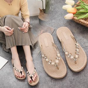 Slippare kvinnor skor 2023 sommar mode kvinnliga pärlor flip flops utomhus strand sandaler
