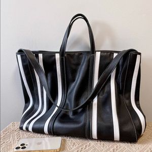 Effortless Chic in Stripes: Oversized Genuine Leather Tote with High-Capacity Luxury, Black & White Color Block Design Pure Leather designer