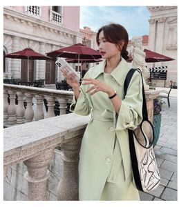 Kvinnors dike rockar Green Coat Female Windbreaker Spring Autumn Lapel Plus Long Double Breasted Sparcing Design Sense Ladies Cloak