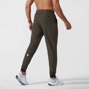 Lululemen mulheres lulu calças curtas yoga outfit jogger esporte secagem rápida cordão ginásio bolsos sweatpants calças dos homens casual cintura elástica fitness2023