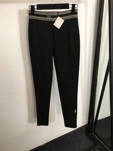 Kvinnors tryckt brev tights byxor mode svart hösten tight capris kvinnor bomullsdesigner mager leggings elasitc midja kvinna kläder