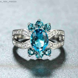 Bandringar Nya mode Lake Blue Stone Rings för kvinnor Bröllopsband Silver Color Round Engagement Ring Promise Lover Jewelry R230831