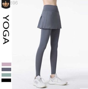 2023 Desginer Al Yoga Pants High Weist Anti Glare Treasable Running Fitness Dance Fake من قطعتين تغطي سراويل تنورة ضيقة