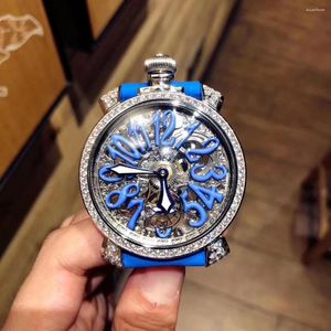 腕時計は、男性の女性向けのダイヤモンドで覆われたダイヤルニュートラルを備えたヨーロッパとアメリカのファッション中空の機械式時計を備えています。