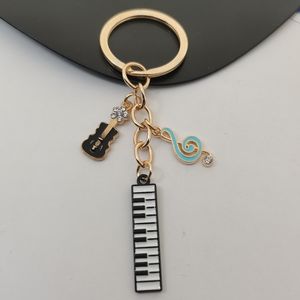 Chaveiros Lanyards Bonito Esmalte Instrumentos Musicais Chaveiro Nota Teclado Guitarra Chaveiro Correntes de Música para Presentes de Artista DIY Jóias Artesanais 230831