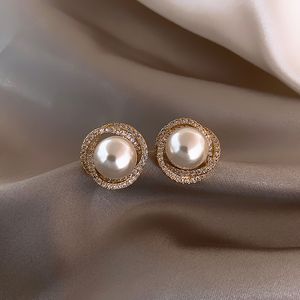 S925 Silver needle Korea Spiral pearl earrings Superior sense of temperament The New stud Girl