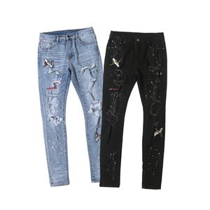 Mens Jeans Luxurys Designer Bieber Embroidery Cranes Pants Ripped Fashion BlACK Star Men Jumpsuit Design Denim Male Pant TOP 29-40256B