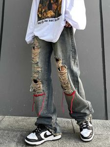 Męskie dżinsy houzhou rozryte dżinsowe spodnie dla mężczyzn punkowe dżinsowe spodnie męskie dżinsy nogi hip hop Harajuku Korean Hippie Hippie Z0301