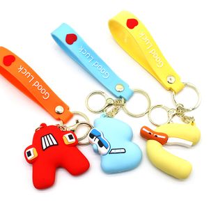 Designer Keychain Telefone celular charme Chaves de carro Pingente de pingente da moda desenho animado anel 26 boneca infantil inglesa do alfabeto