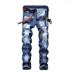 Jeans da uomo Toppe maschili con bandiera americana Design Jeans blu con fori Pantaloni dritti slim strappati in difficoltà1