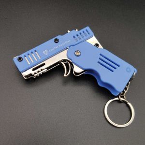 key chains alloy plastic M1 mini pendant folding rubber band gun can be used for 6 consecutive children's toy soft bullet gun.