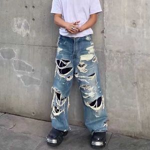 Jeans da uomo stile Vibe pantaloni distrutti moda Hi Street strappati pantaloni hip-hop oversize in denim vestibilità ampia fondo effetto consumato Y2303