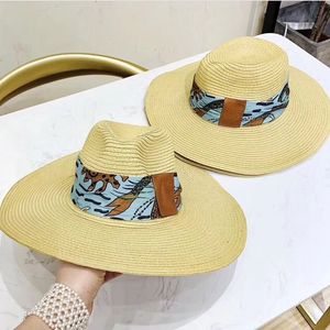Opvallend gekleurde lintbrede rand Women Dome Loose Straw hoeden Zomer vrouwelijk strand luie zonnedoppen