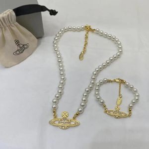 Fashion Saturn Bracelet com acessórios de moda de caixa de bilheteria de pérolas pérolas de tênis de diamante pérolas pulsetas jóias de designer de ouro feminino