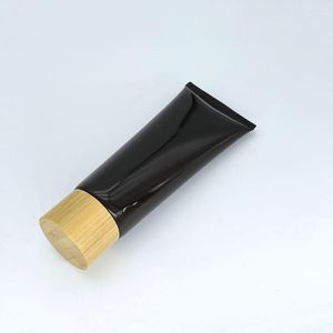 Garrafas de armazenamento 50ml 80ml 100ml Plástico vazio Squeeze recipientes cosméticos Recipientes recarregáveis ​​Tubo macio preto e brilhante com tampa de bambu