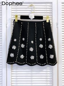 Rokken 2023 kralen bloem zware industrie strass mini rok vrouwen hoge taille slanke zwarte faldas ontwerp sense a-line sheath