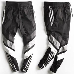 Mens Pants Spring Summer Sports Pants Men Tooling Pants Male Beam Feet Male Youth Version Closing Feet Nine Points Pants Casual Pant 230303