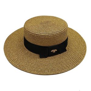 Cappello di paglia intrecciato in oro retrò europeo e americano primavera ed estate Little Bee Cappello a cilindro piatto da viaggio con protezione solare a tesa larga da donna