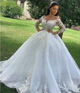 Abito da sposa scintillante Abito da sposa trasparente con scollo a V maniche lunghe 2023 Applicazioni in pizzo con perline Abiti da sposa su misura Robe De Mariage