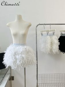 Saias 2023 Primavera no verão Feather curta uma linha feminina cintura elástica branca todos combinam tutu feminino aluno mini 230303