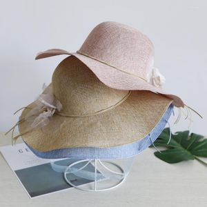 Szerokie brzegowe czapki Summer Słomka Słońce Słomka Słomiana Kobiety Bow Outdoor Beach Caps Cape Cap Szybka sucha ochrona UV Modna Moda