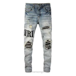 Męskie dżinsy Nowe przybysze męskie luksusowe dżinsowe dziury spodnie Jean Coolguy Biker Pants Man Clothing