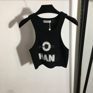 23SS女性デザイナーティーベストニットスパンコール文字付きTシャツをジョギングパターンクロップトップ滑走路ハイエンドブランドストレッチノースリーフキャミソールジャンパープルオーバーK992