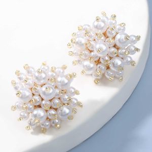 Charm Pauli Manfi Fashion Simple Metal Imitation Pearl Flower Earrings Women's Popular Gypsophila Flower Earrings Banquet Earrings G230307