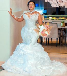Arabiska aso ebi vita sjöjungfru bröllopsklänningar med löstagbar tåg gillter pärlstav kristaller illusion långärmad brudklänningar