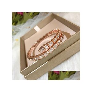 Charm Bracelets Fashion Designer Bracelet Fine Jewelry Spring Snake Shaped Cuff For Women Gold Charming Couple Lovers Birthday Gift Dhbyn