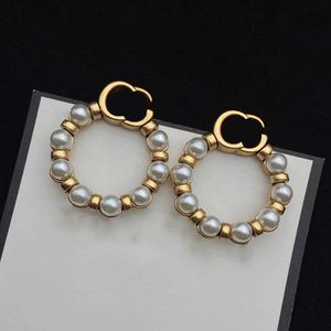 Kvinnors hoop örhänge modedesigner pärla örhängen kvinnor designers hoops örhängen ornament smycken tillbehör gåvor 2go