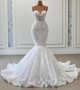 Abiti da sposa a sirena con perle sexy 2023 Abito da sposa da spiaggia con applicazioni in pizzo senza spalline