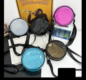 Unisex seyahat spor salonu omuz crossbody çanta tasarımcısı lazer pvc net yuvarlak çanta parlak renk reklamı