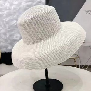 2023 Audrey Hepburn cappello di paglia strumento di modellazione incassato cappello a tesa larga a forma di campana vintage alta finta atmosfera da spiaggia turistica CX200714