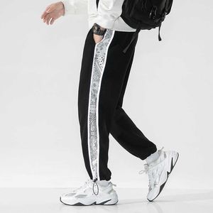 Herrbyxor lapptäcke streetwear män kvinnor överdimensionerade sportbyxor bandana dragstring tröjor man