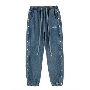 Jeans da uomo Jeans blu lavati con bottoni laterali Pantaloni con coulisse Pantaloni da uomo dritti Hip Hop Baggy Cargos Unisex Pantaloni casual oversize in denim Z0301