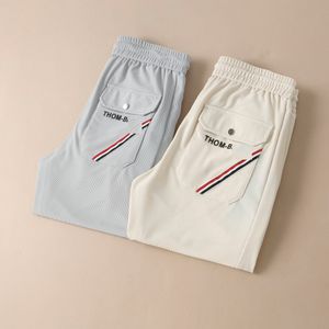 Tasarımcı Pantolon Mens Tpants TB 2023 İlkbahar/Yaz Sayaç Yeni Moda Zarif Erkekler Özelleştirilmiş Top Tek İş Pantolon İlkbahar/Yaz İnce Sıradan Pantolon