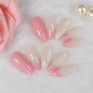 Unghie finte Girly Pink French Style Stampa su beige nudo medio lungo finto Ongles con design floreale Immagini vere delle unghie