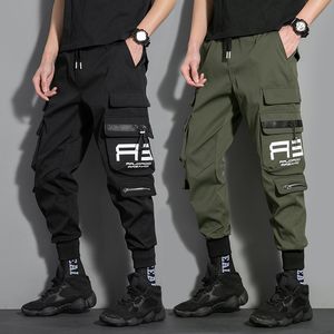 Calças masculinas fitas carga hip hop bolsos corredores casuais sweatpants masculino tático streetwear techwear 230309