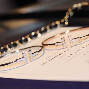 Oryginalna marka klasyczna moda podwójna tff ręcznie inkrustowana z wysokim węglowym diamentowym złotem CNC precyzyjna złota platforma jakość elastyczna bransoletka