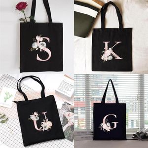 Shoppingväskor väska kvinnor handväska axel ladiesshopper canvas pendla stor kapacitetsskola tyge rosa blommor brev tryck