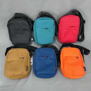 Moda kadın tuval omuz çantası çanta düz renkli öğrenci telefon çantası basit fermuar küçük haberci crossbody torbası