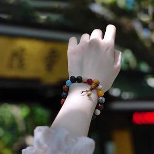 Armband Lingyin Temple arton fröarmband, Multi Treasure Buddha -pärlor, logistikkontor, Xingyue Bodhi, Hangzhou -sträng, kvinnlig hand