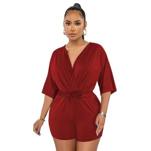 Kvinnor ett stycke jumpsuits sommar sexig wrap v nack strand rompers casual kort ärm elastisk midja korta jumpsuits med fickor