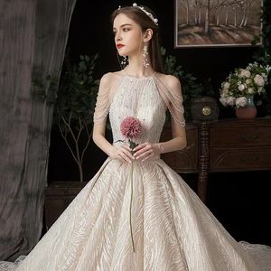 Dubai Arabic Ball Gown Wedding Dresses Plus Size Sweetheart Backless crystal Sweep Train Bridal Gowns Bling Luxury long sleeve Beading Sequins Wed Dresses