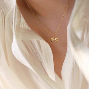 AFSHOR Collane con ciondolo Bowknot color oro argento delicato alla moda per le donne Regalo di gioielli fatti a mano dal design unico