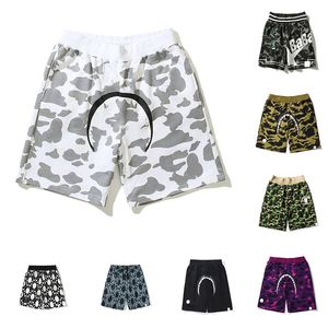 Homens e mulheres shorts exclusivos designer moda tendência fitness tubarão calças esportivas curto simples e generoso masculino verão ginásio exercício ventilação