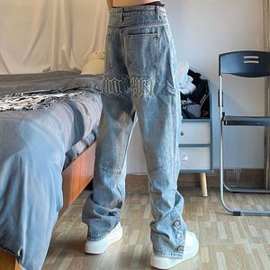 Kvinnors jeans för män och kvinnor vintage broderade jeans baggy pocket -knapp split denim byxor blå 230313