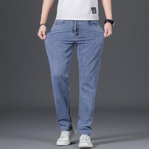 Jeans da uomo 2023 tessuto di cotone alto stile classico pantaloni comodi da lavoro elastici dritti pantaloni maschili neri azzurri