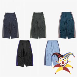 Calça masculina agulhas largas calças de moletom de homem Mulheres agulhas awge calças de perna larga Bordado calças de borboleta 230313